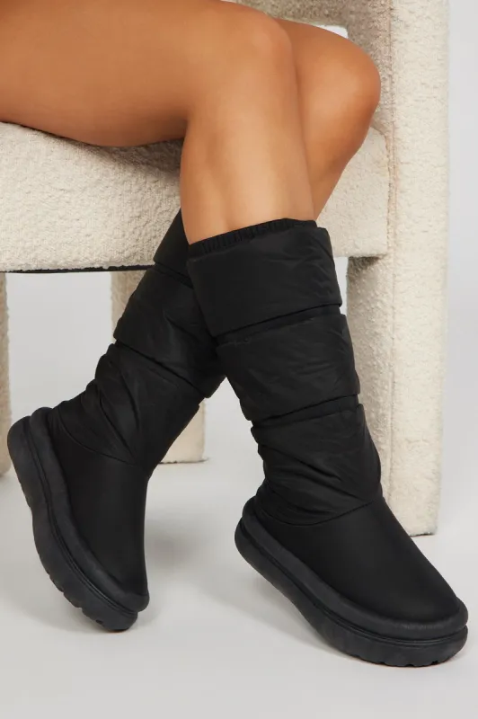Snow Glam Puffer Boots - Black sold by Fashion Nova