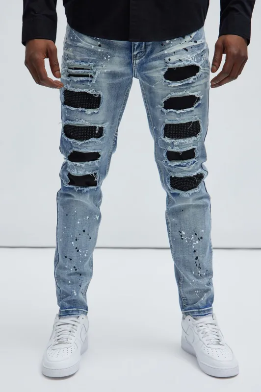 Rise Above Patched Distressed Skinny Jeans - Medium Wash sold by Fashion Nova