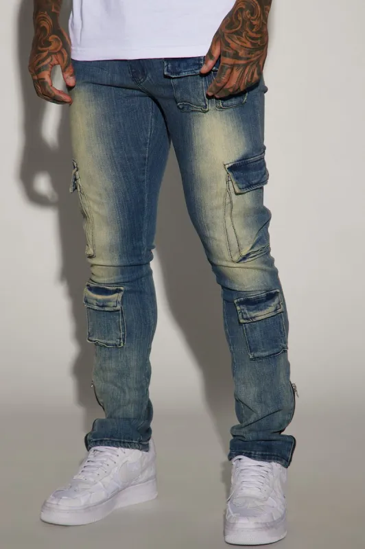Pocket Me Cargo Stacked Skinny Zipper Flare Jeans - Medium Wash sold by Fashion Nova