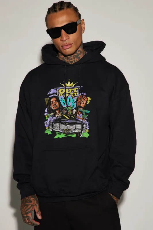Outkast Cartoon Car Graphic Hoodie - Black sold by Fashion Nova