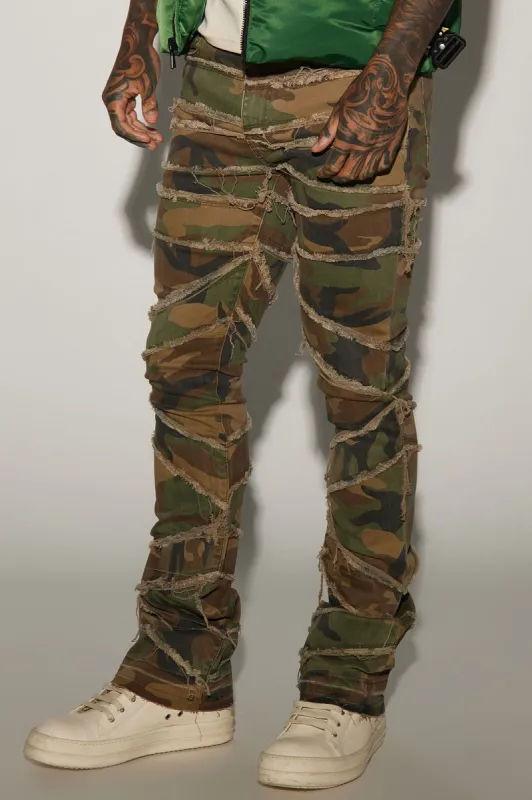 In All Ways Fray Stacked Skinny Flare Pants - Camouflage sold by Fashion Nova