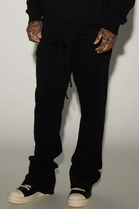 Tyson Row Down Flared Sweatpant - Black sold by Fashion Nova