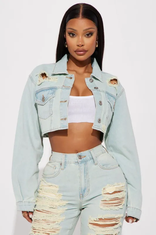 Rhea Ripped Tinted Denim Jacket - Light Wash sold by Fashion Nova