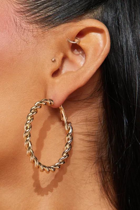 Twisting My Words Earrings - Gold sold by Fashion Nova