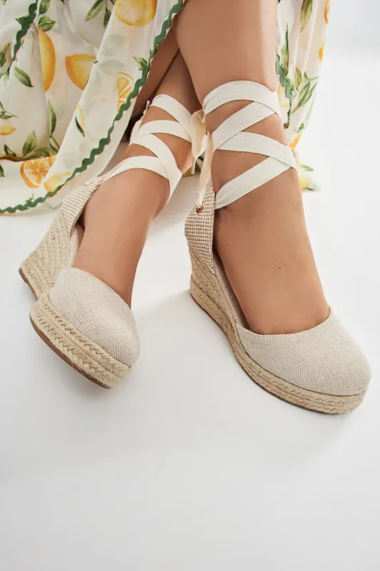 Daniella Wedges - Beige sold by Fashion Nova