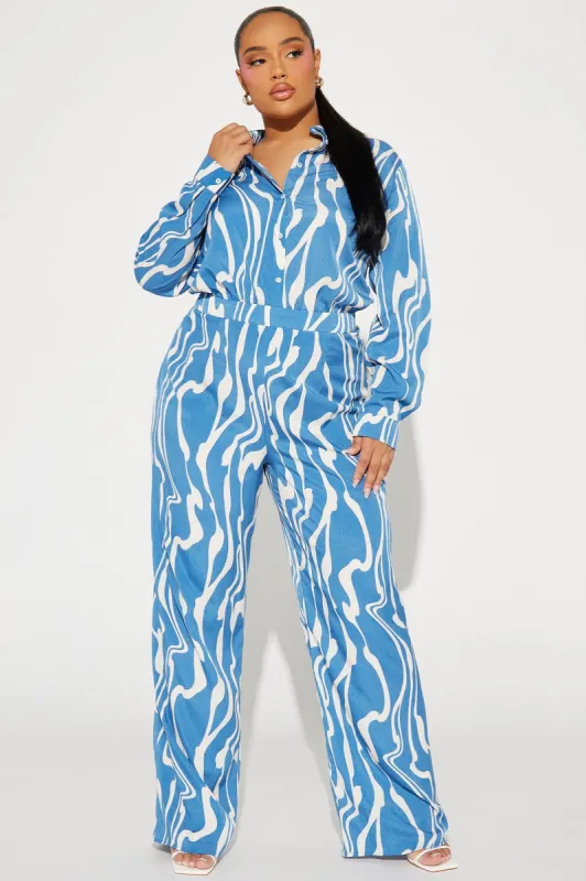 Muriel Jumpsuit - Blue sold by Fashion Nova