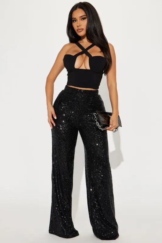 After Glow Sequin Flare Pant - Black sold by Fashion Nova