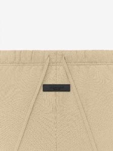 Essential Hoodie sold by Fear of God