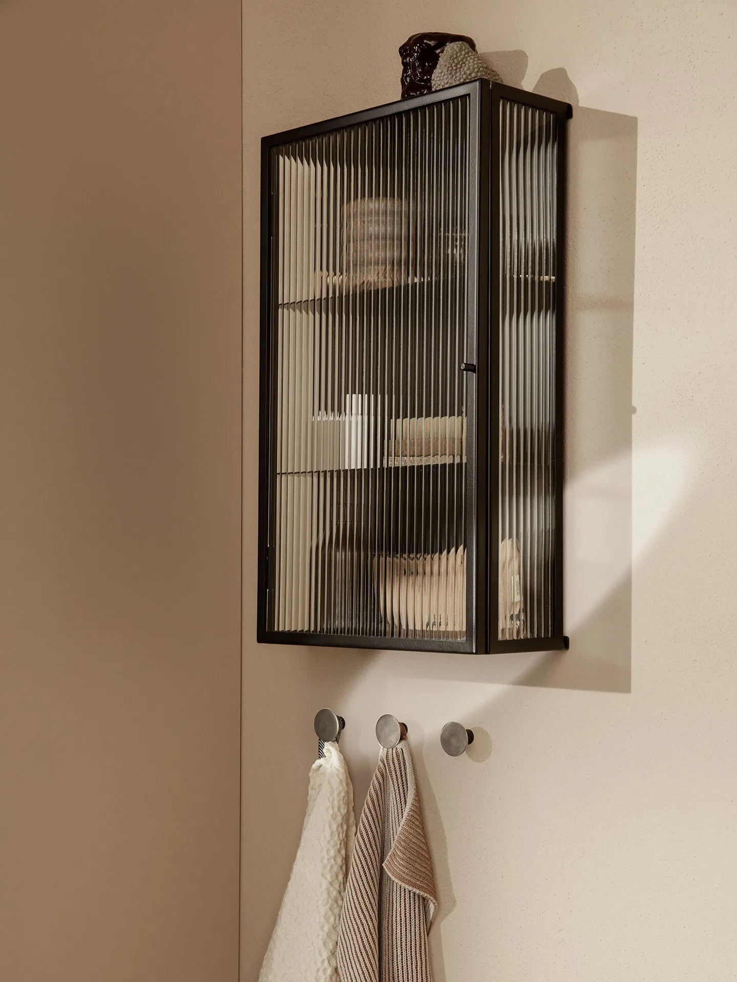 Haze Wall Cabinet - Reeded Glass - Black sold by Ferm Living product image thumbnail 2