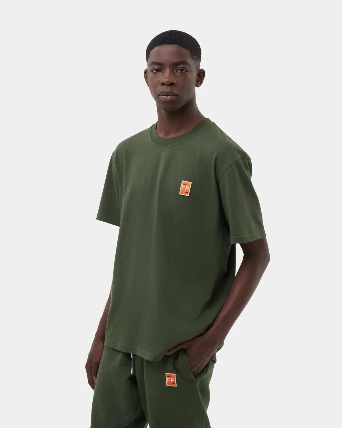 Tee Lux Kombu Green sold by Filling Pieces