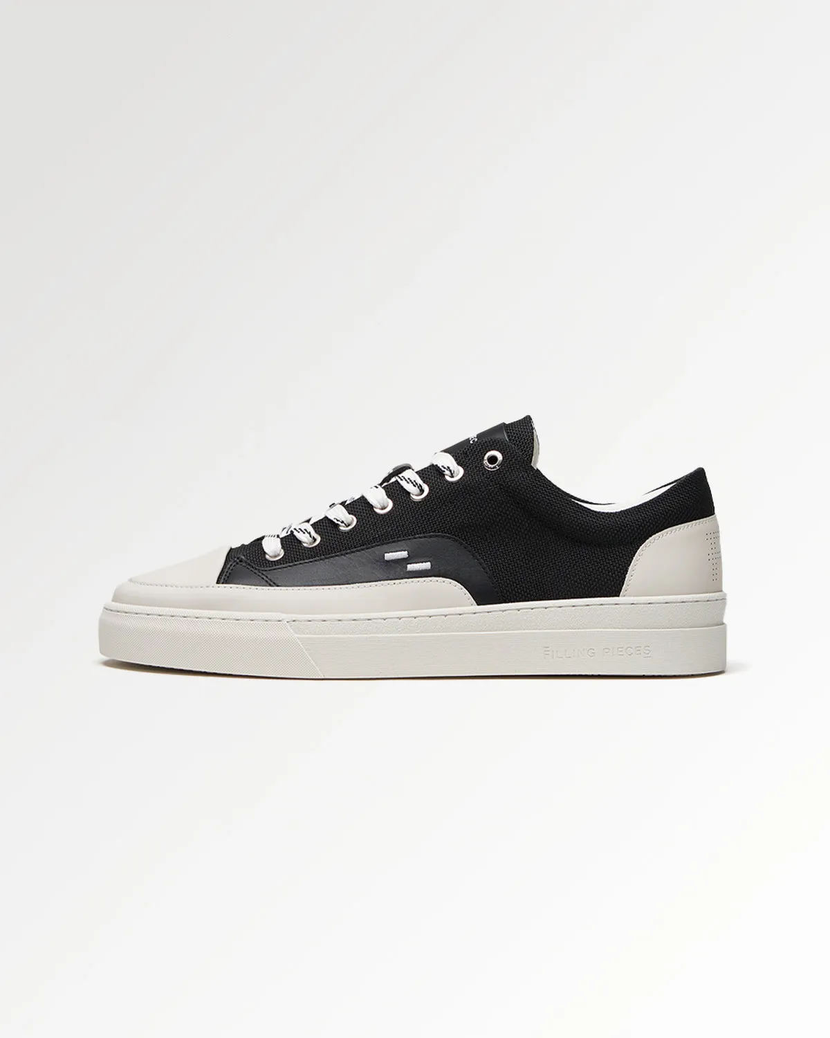 Riviera Low Black sold by Filling Pieces