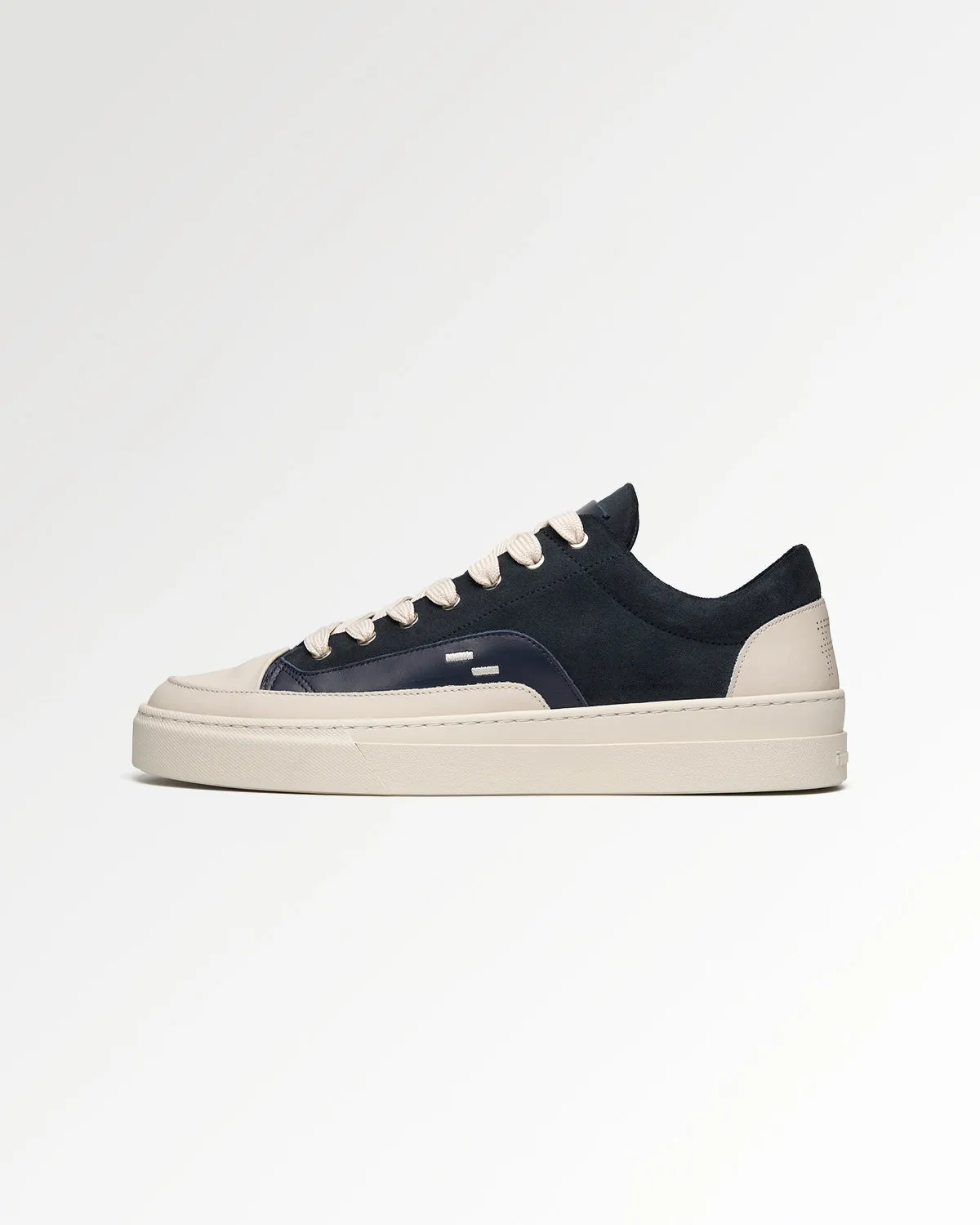 Riviera Suede Navy sold by Filling Pieces