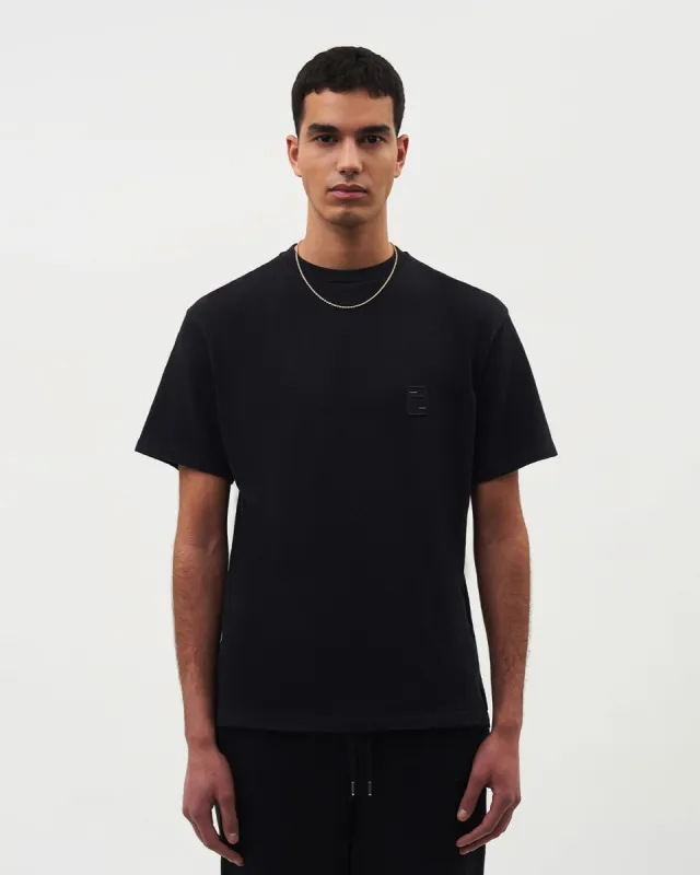 Lux Tee Black sold by Filling Pieces