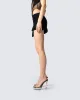 Rena Black Asymmetrical Mini Skirt sold by Finesse