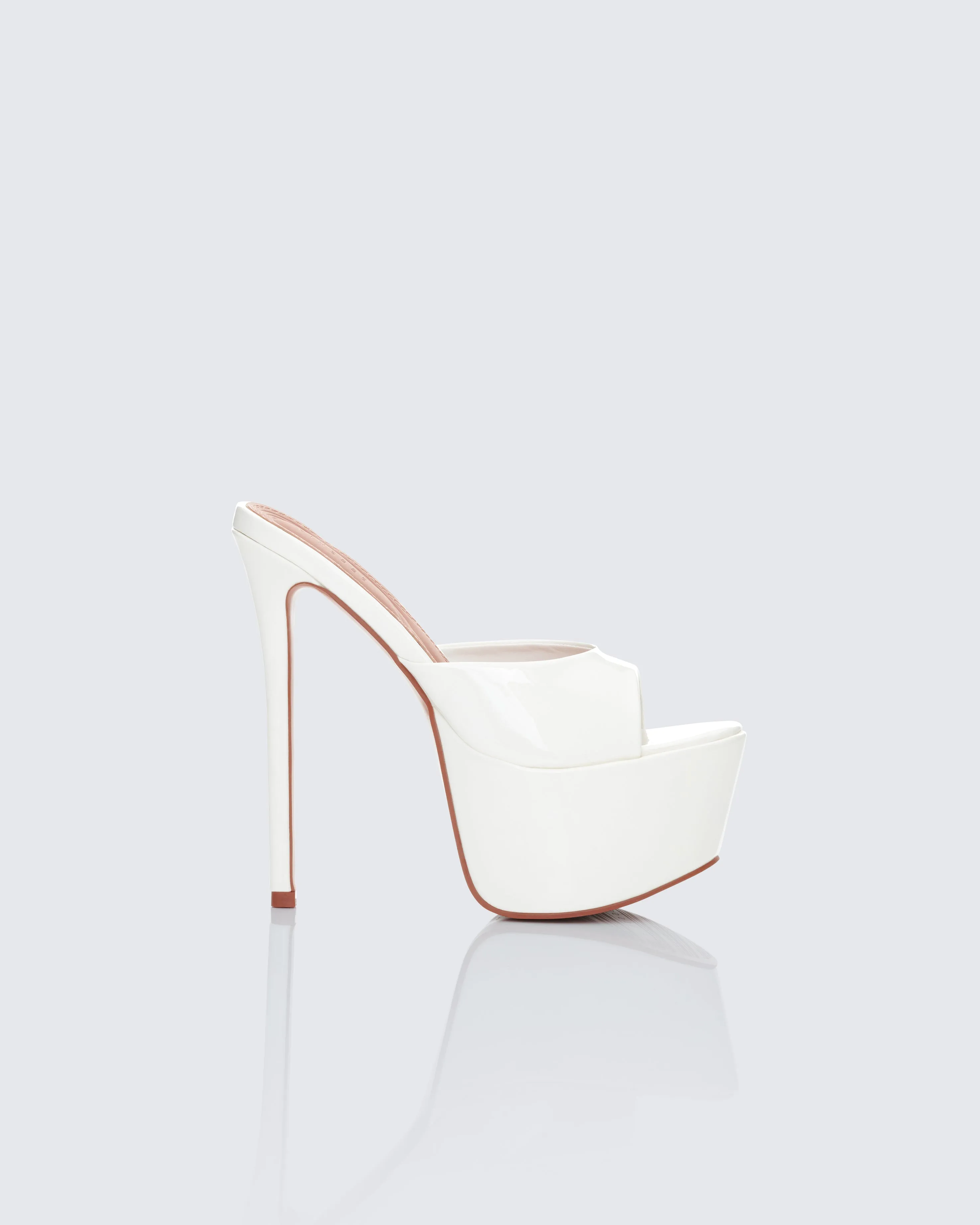 Portia White Platform Mules sold by Finesse