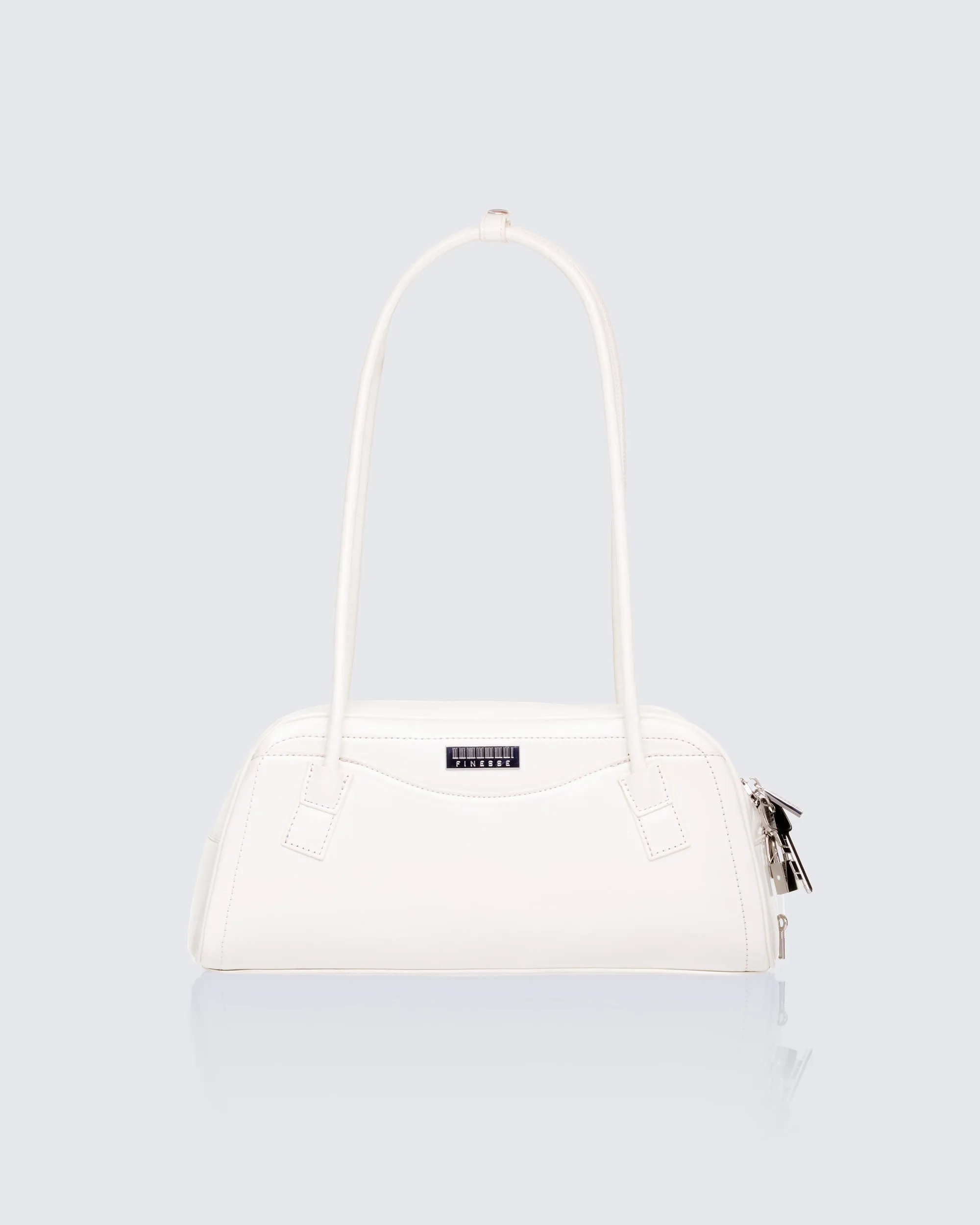 Nyra White Iconic Bowler Bag sold by Finesse