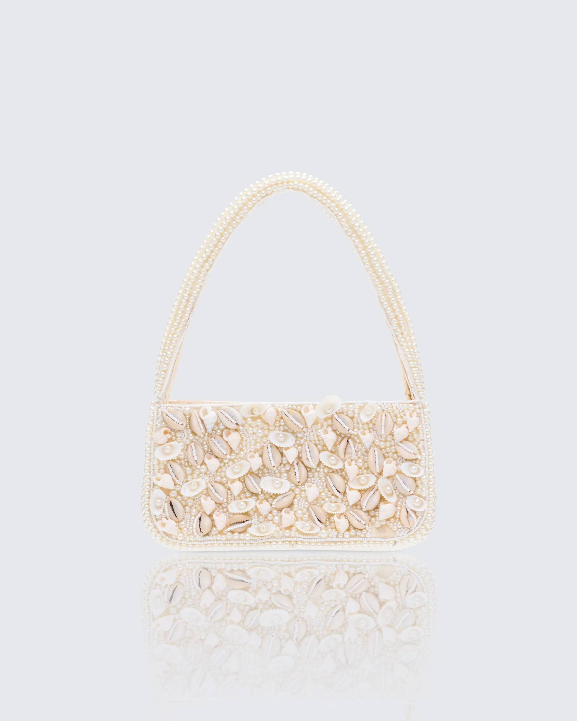Sadaf Ivory Cowrie Shell Handbag sold by Finesse