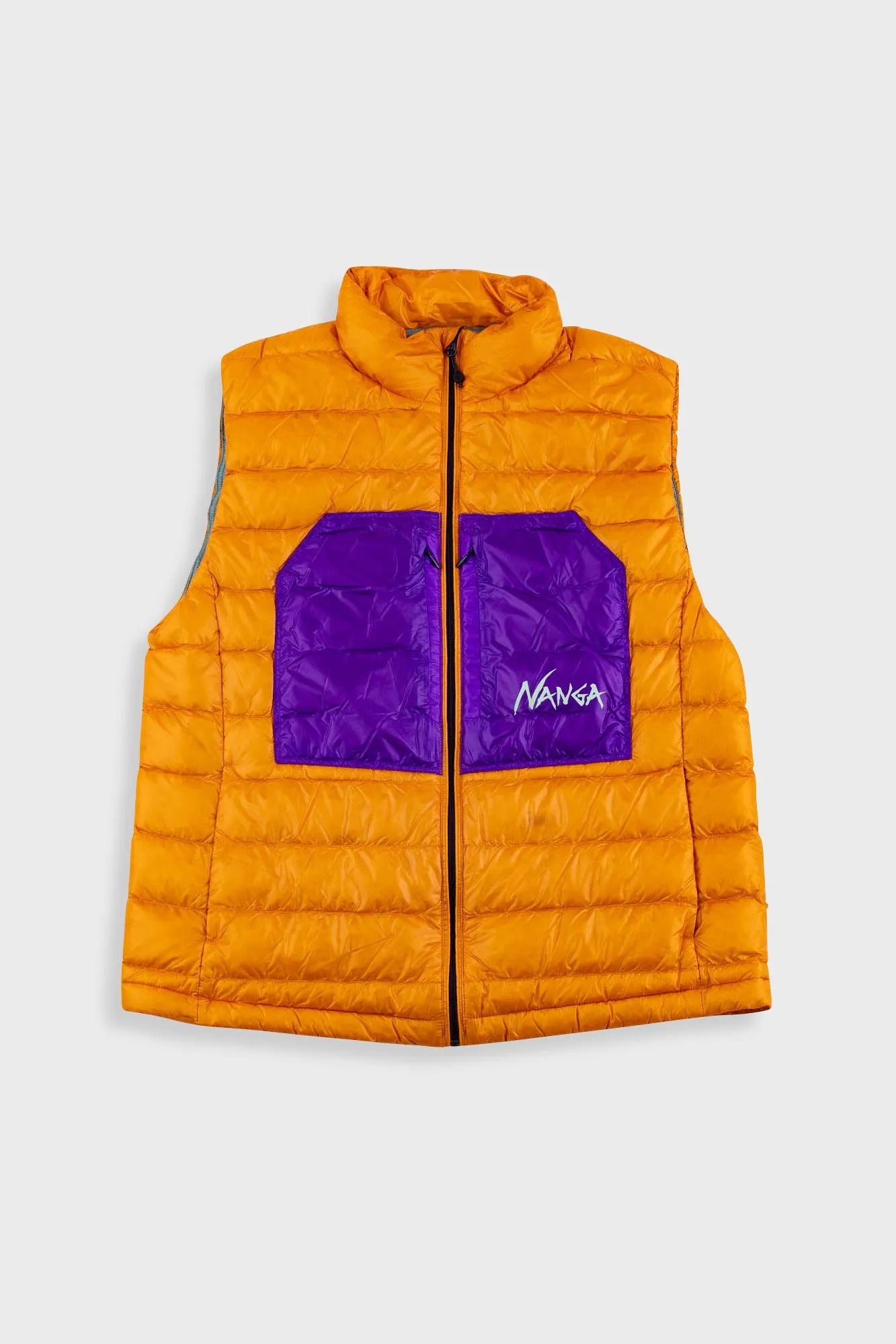 Nanga | Ultilight Down Packable Vest - Orange sold by Folk