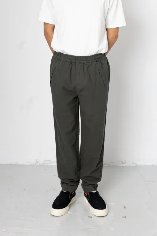 Darwin Assembly Crinkle Trouser - Choco Green made by Folk