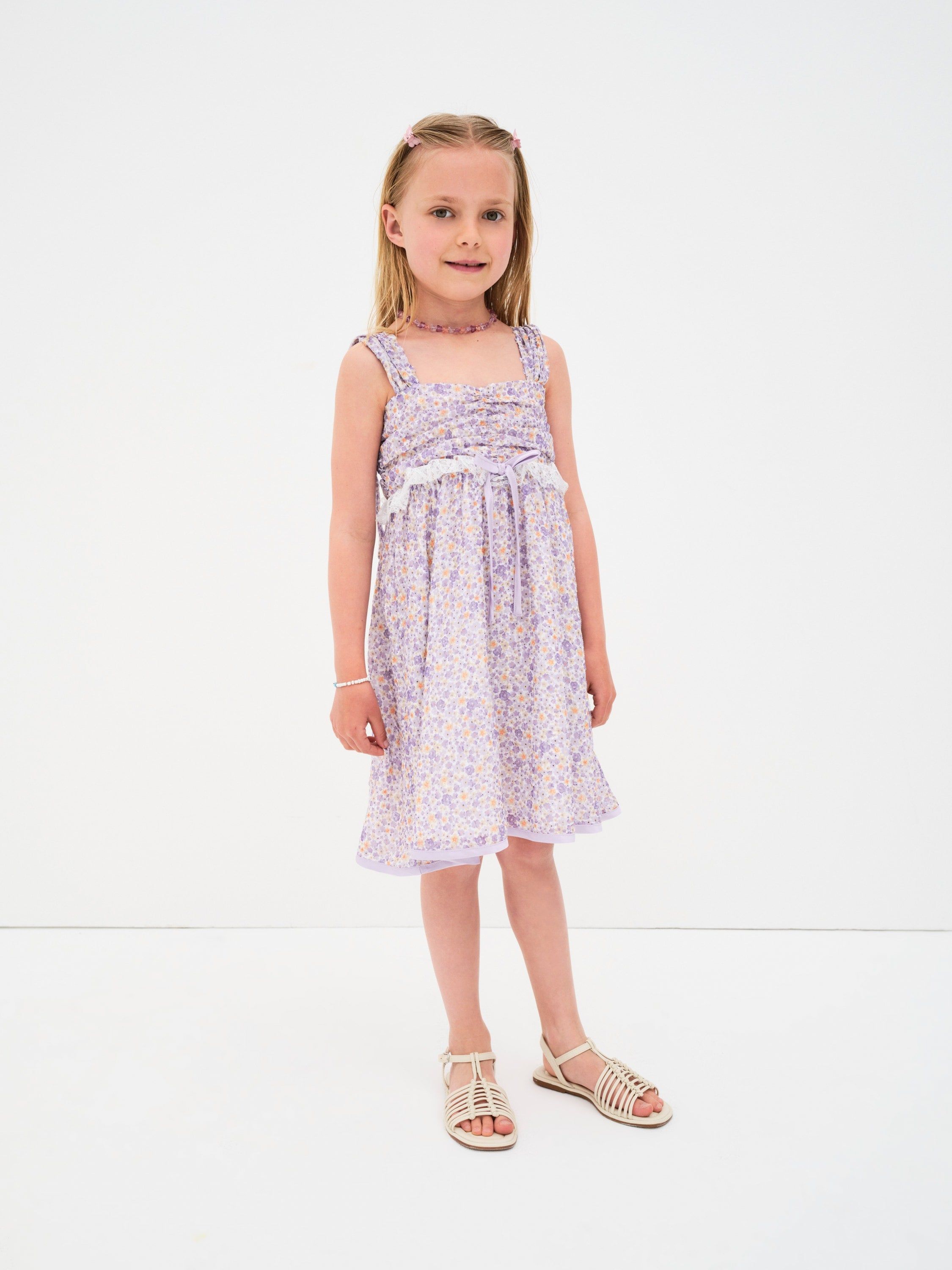 Lavender Daisy Ruffle sold by For Love And Lemons