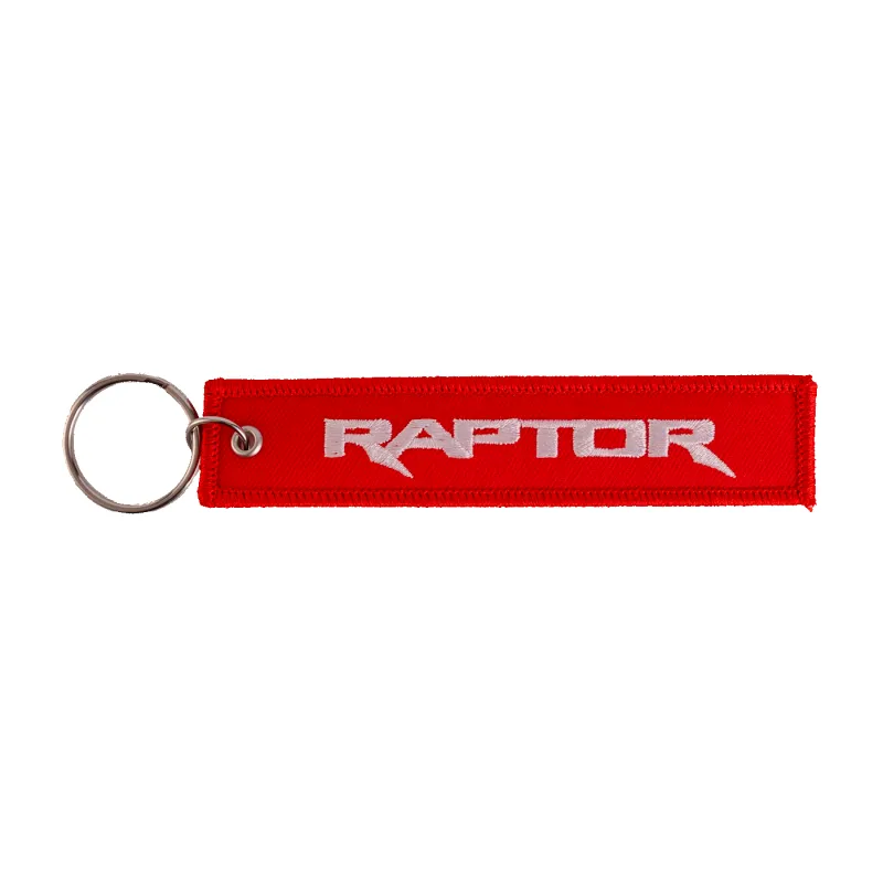 Ford Raptor Red Remove Before Rally Keychain sold by Ford