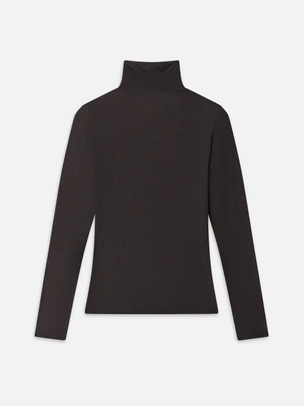 The Hosiery Turtleneck sold by Frame Denim