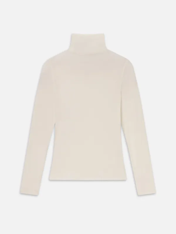 The Shadow Turtleneck -- Cream made by Frame Denim