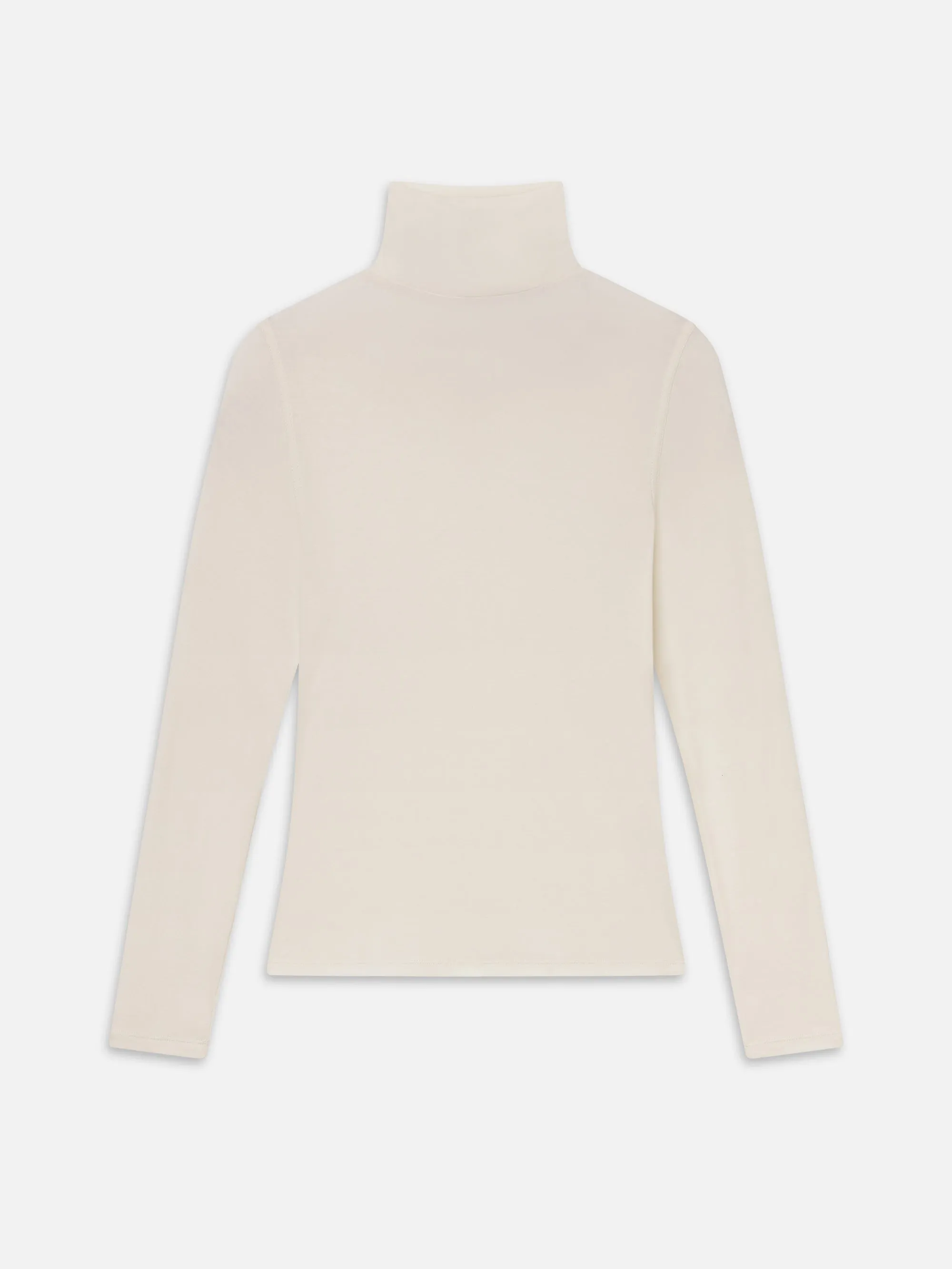 The Shadow Turtleneck -- Cream sold by Frame Denim