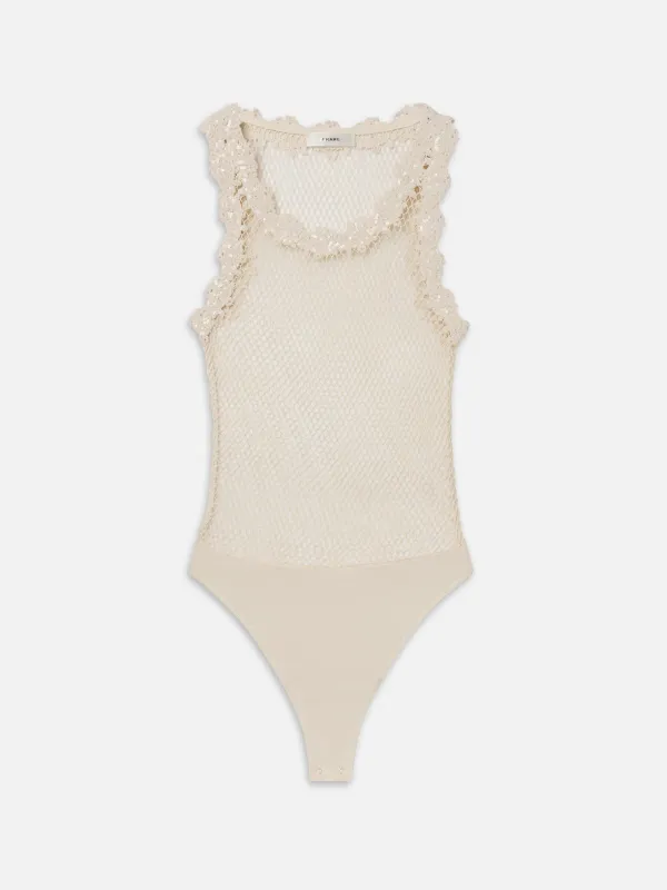 The Mesh Glimmer Bodysuit -- Cream made by Frame Denim