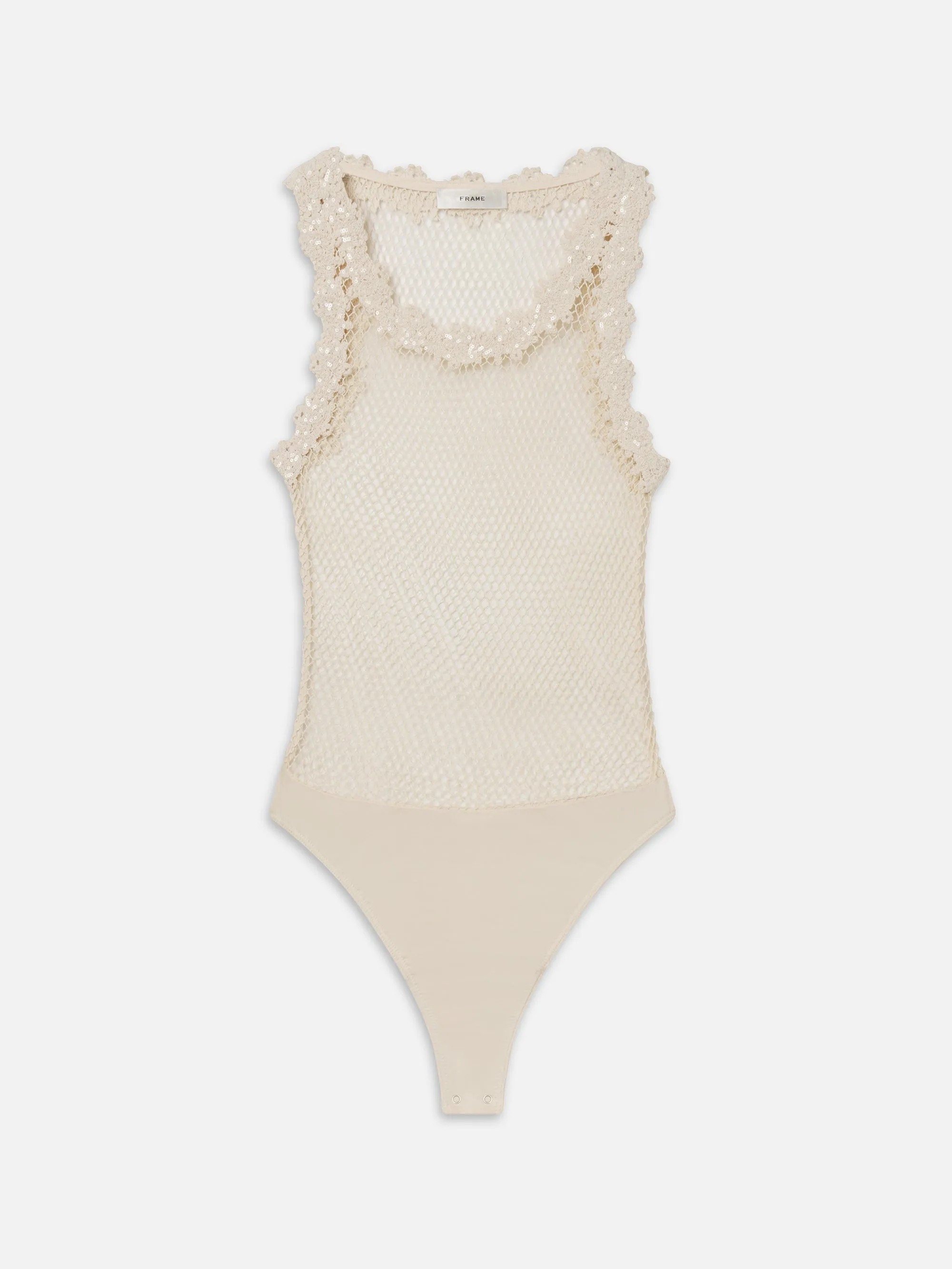 The Mesh Glimmer Bodysuit -- Cream sold by Frame Denim