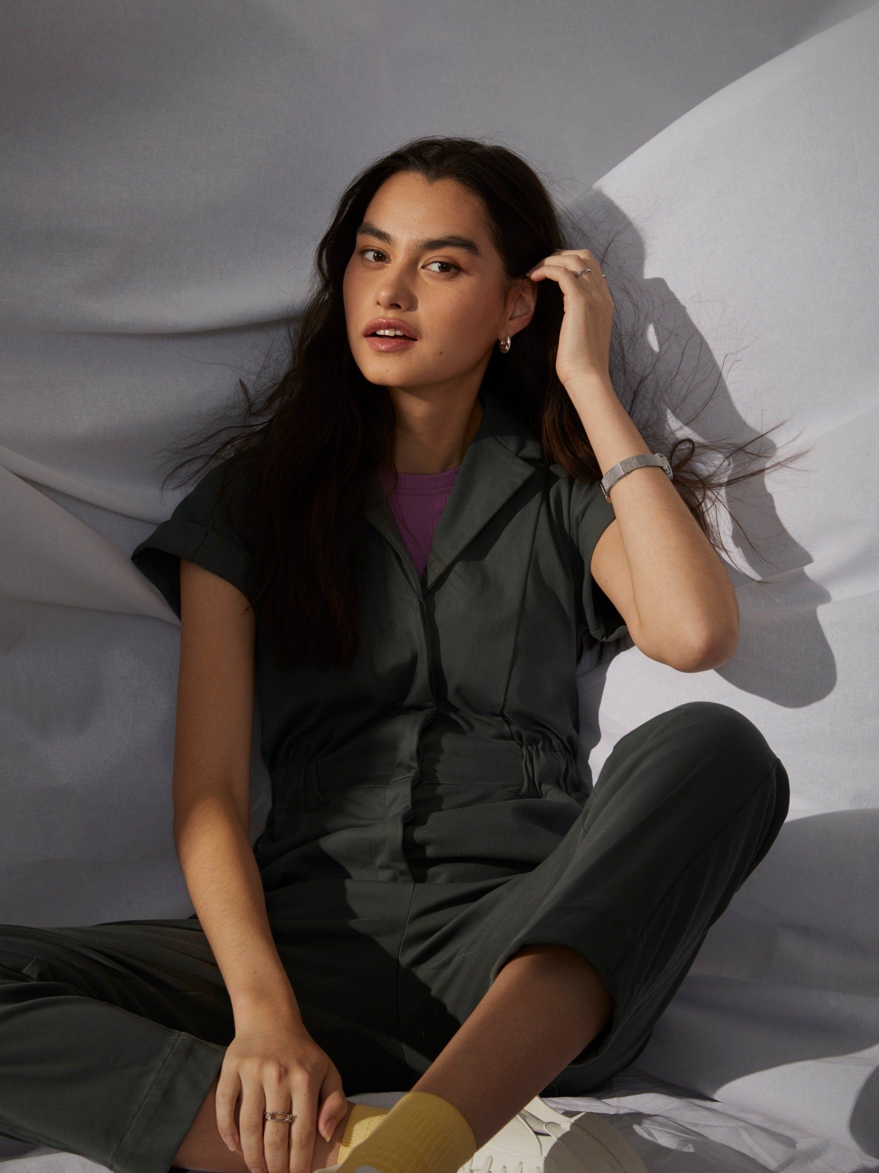 The Flex Commuter Jumpsuit in Smoked Green sold by Frank & Oak