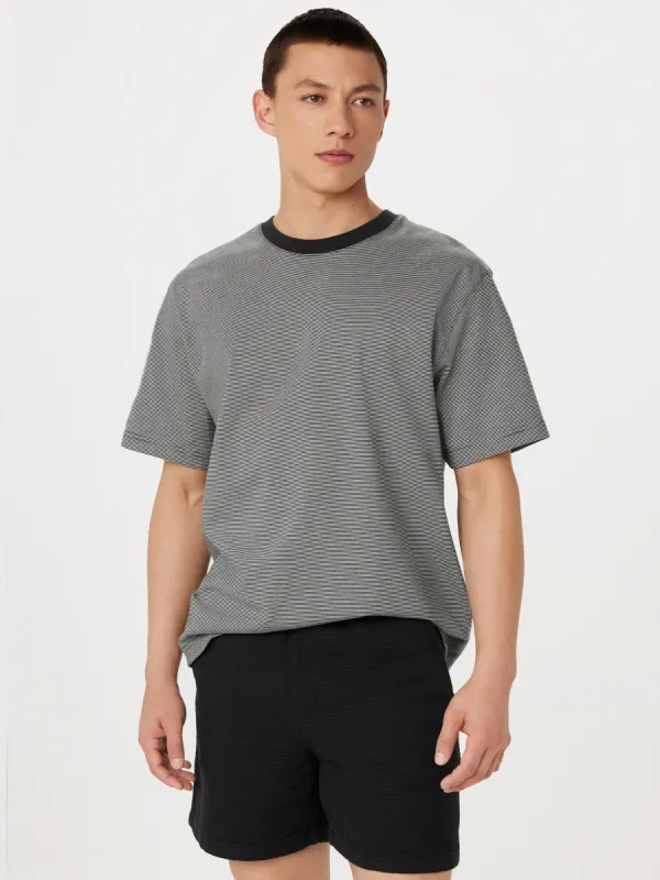 The Striped Boxy T-Shirt in Washed Black sold by Frank & Oak