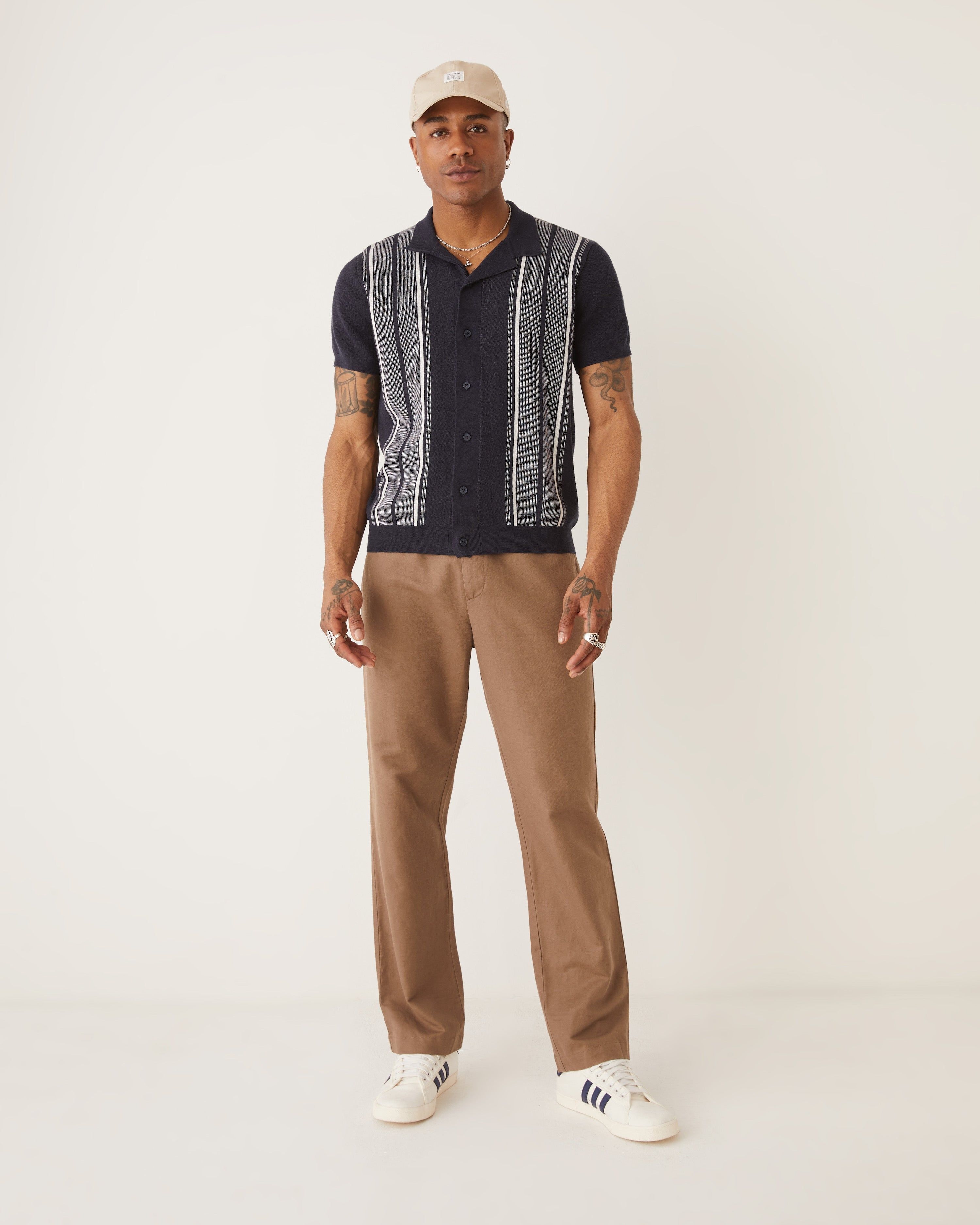 The Button-Up Polo Knit in Navy sold by Frank & Oak