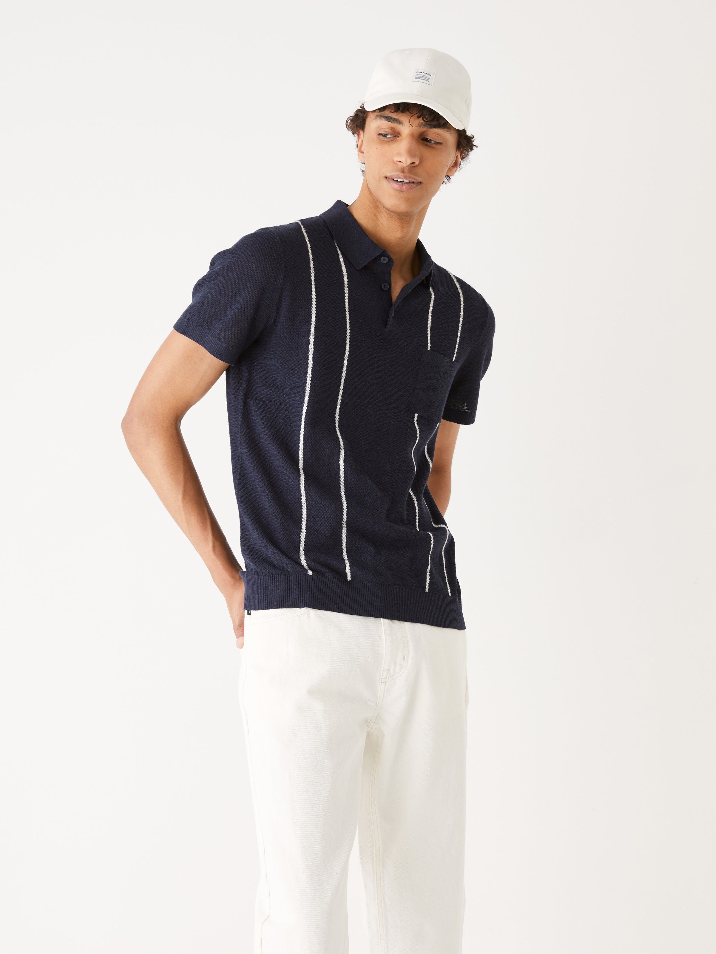 The Linen Short-Sleeve Polo in Navy sold by Frank & Oak