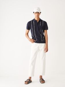 The Linen Short-Sleeve Polo in Navy sold by Frank & Oak