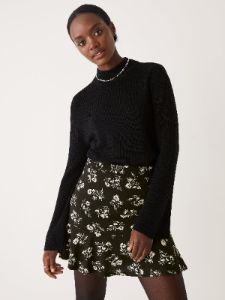 The Floral Print Mini Skirt in Black sold by Frank & Oak