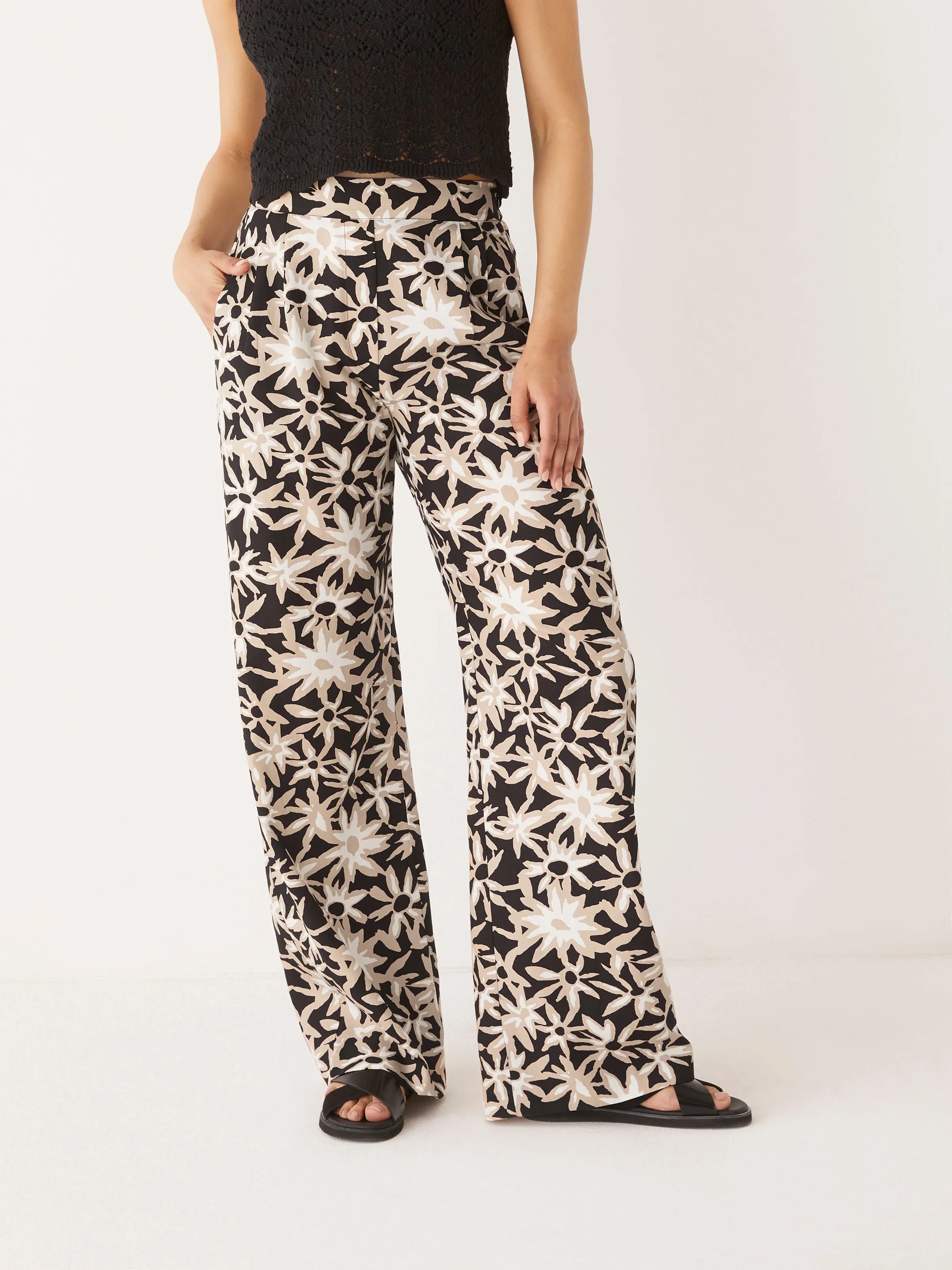 The Sally Wide Leg Fluid Pant in Black sold by Frank & Oak