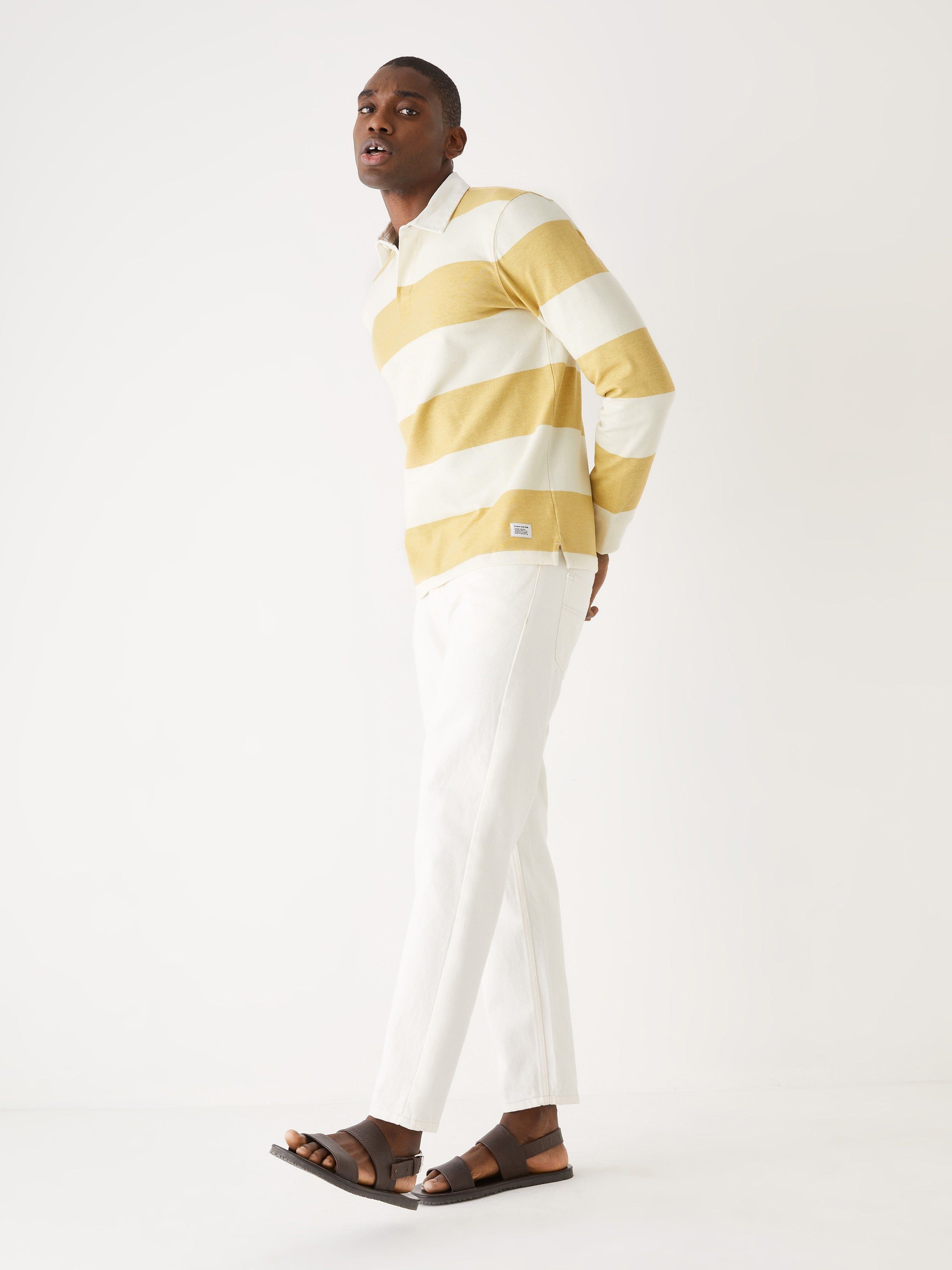 The Long Sleeve Striped Polo Shirt in Faded Green sold by Frank & Oak