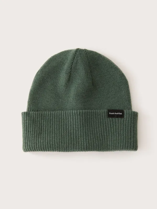 The Merino Wool Beanie in Evergreen sold by Frank & Oak