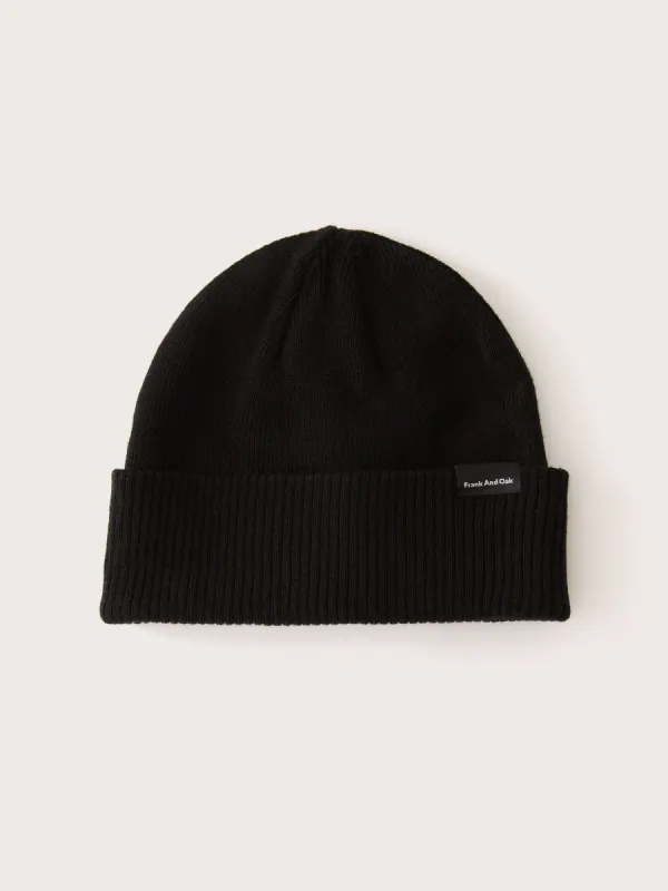 The Merino Wool Beanie in Black sold by Frank & Oak