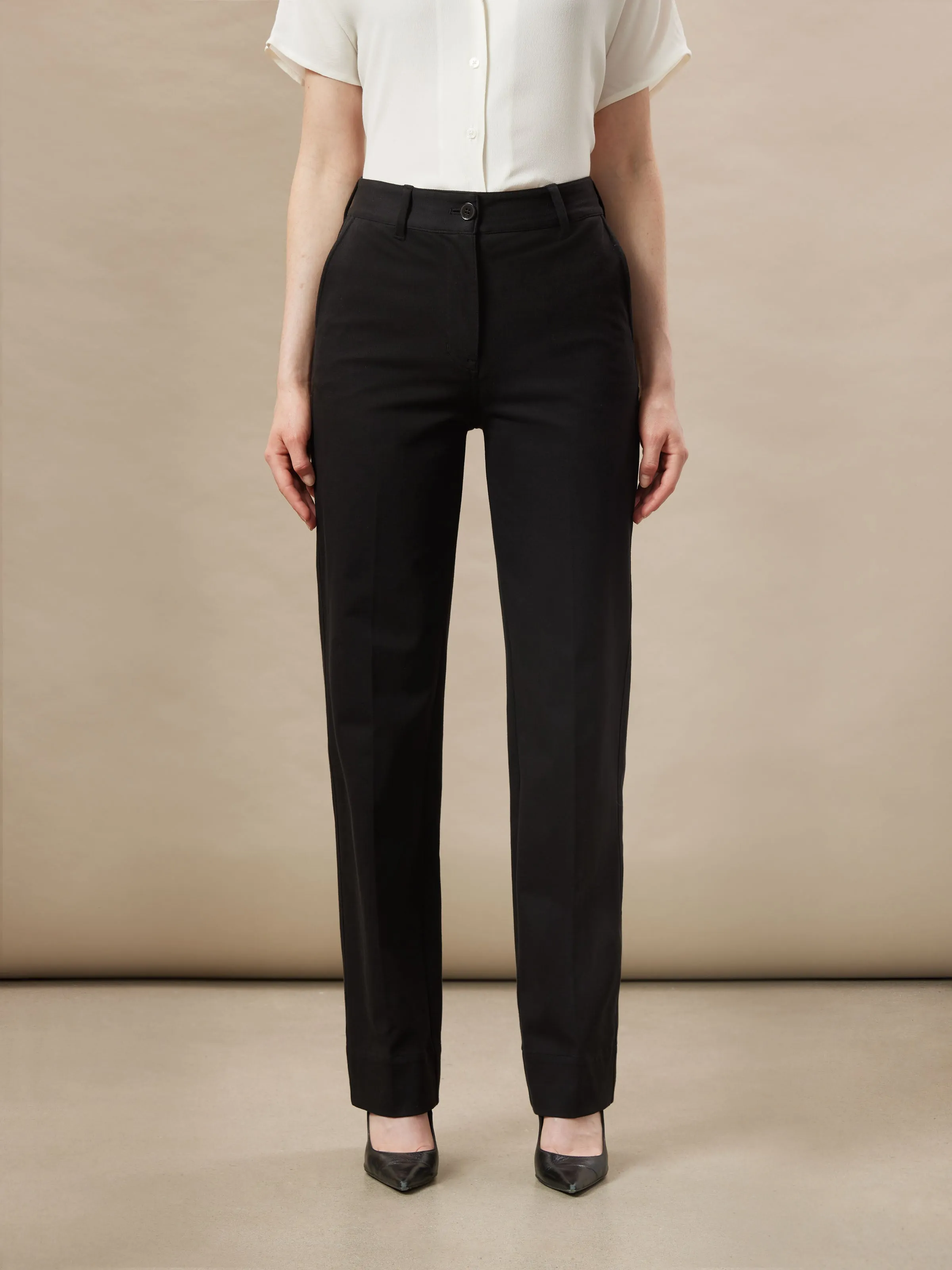 The Jane Straight Flex Pant in Black sold by Frank & Oak