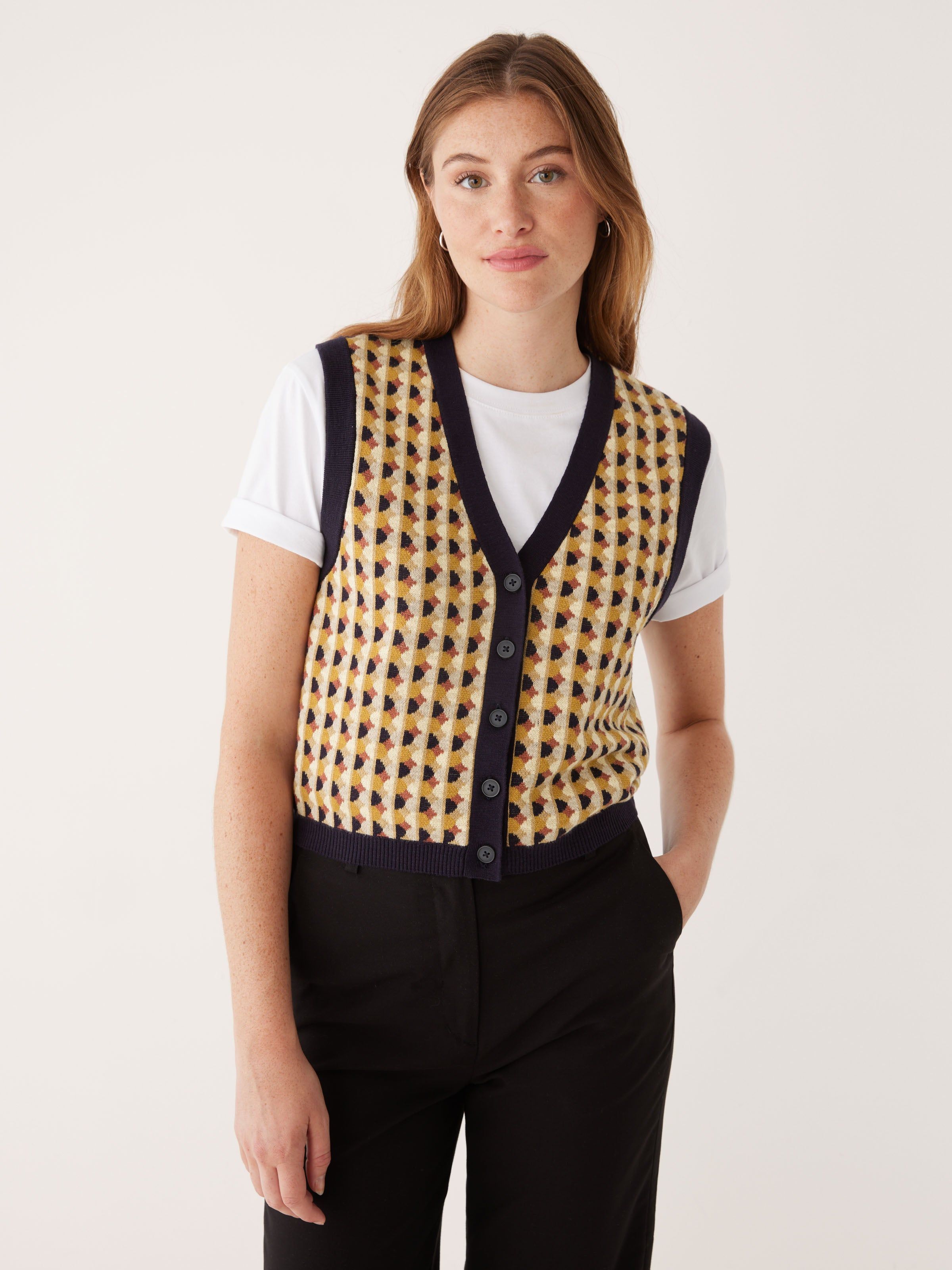 The Button-Up Sweater Vest in Daisy sold by Frank & Oak