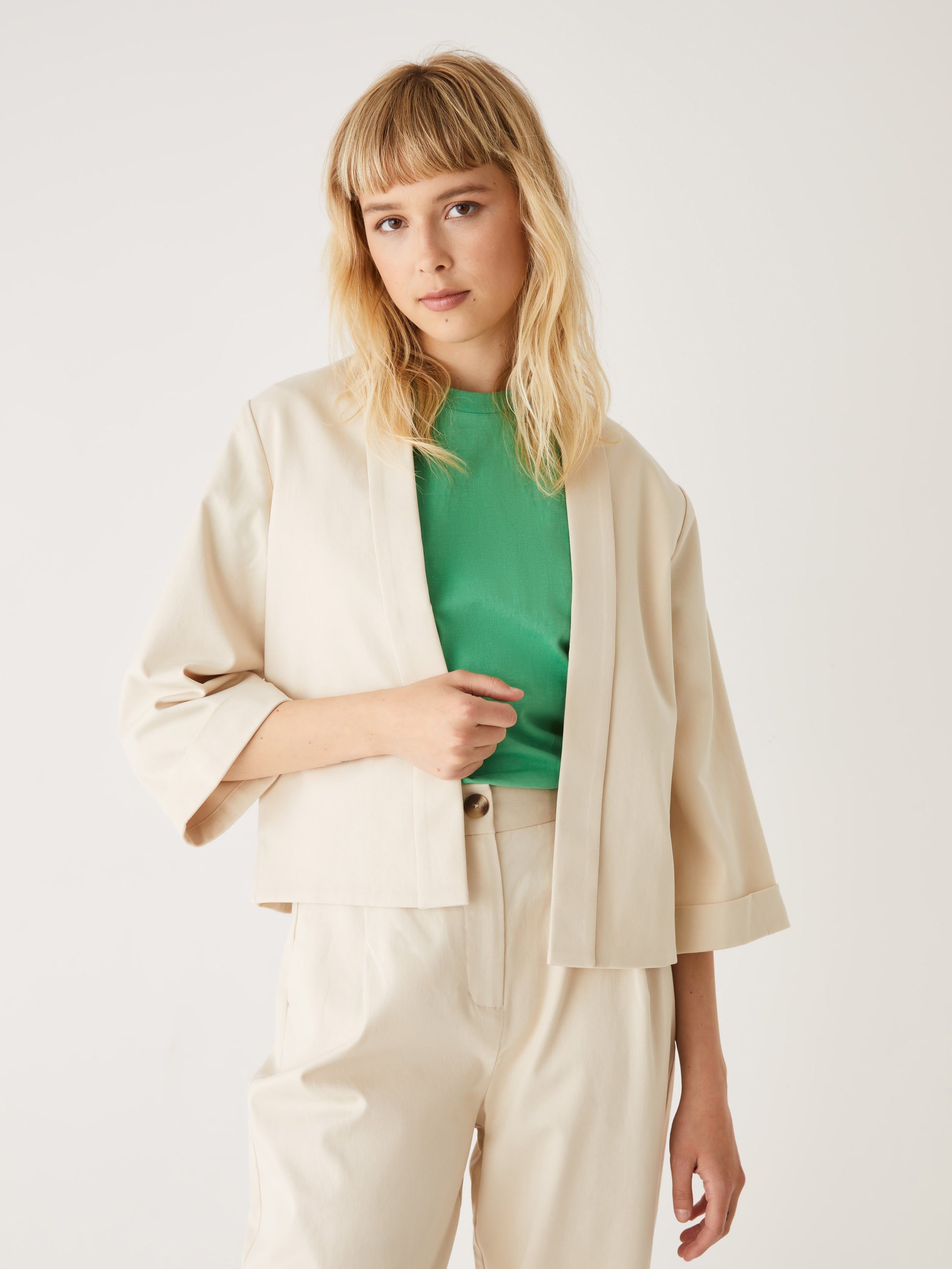 The Cropped Overpiece in Beige sold by Frank & Oak