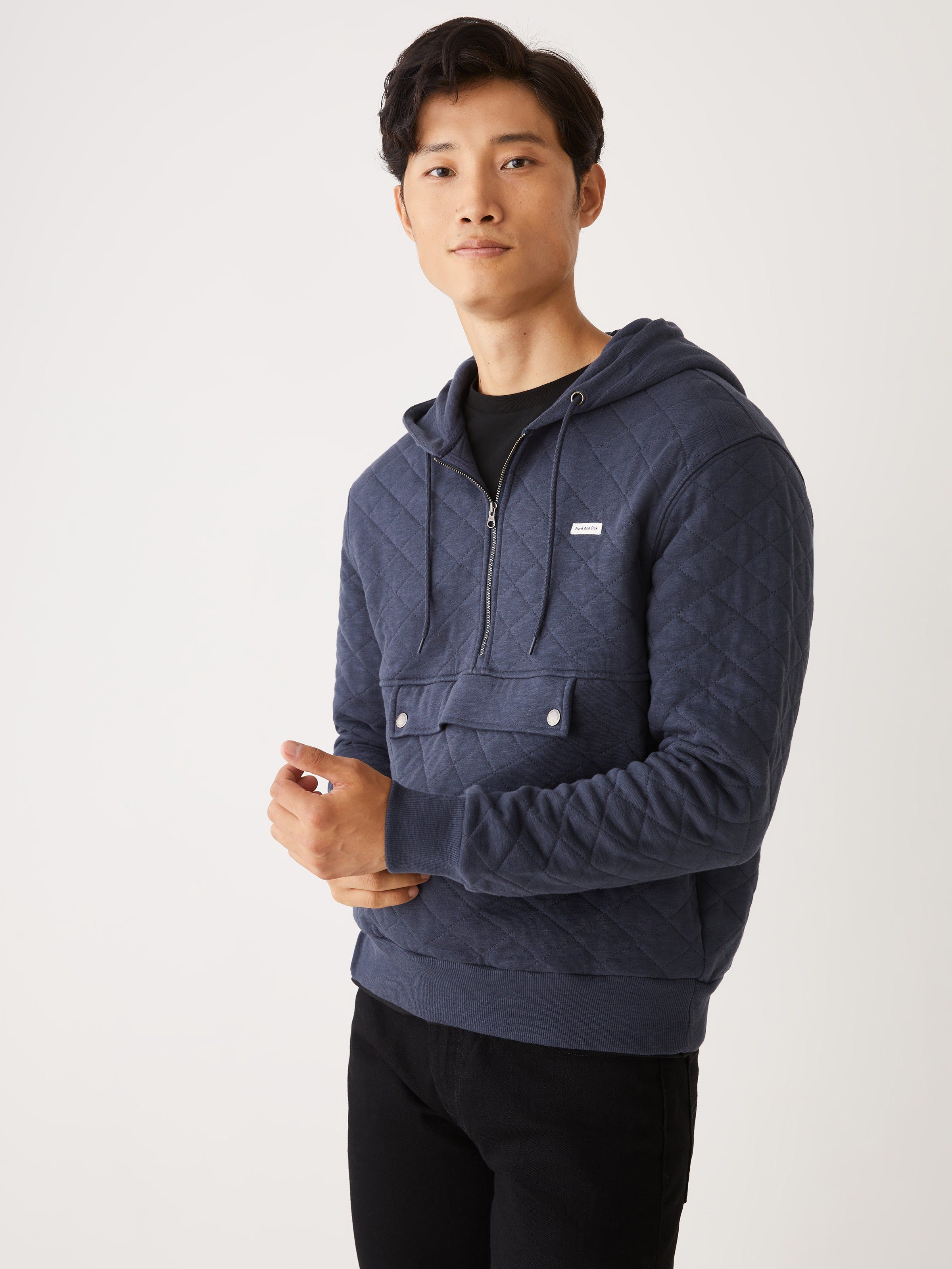The Quilted Half-Zip Pull-Over in Night Blue sold by Frank & Oak