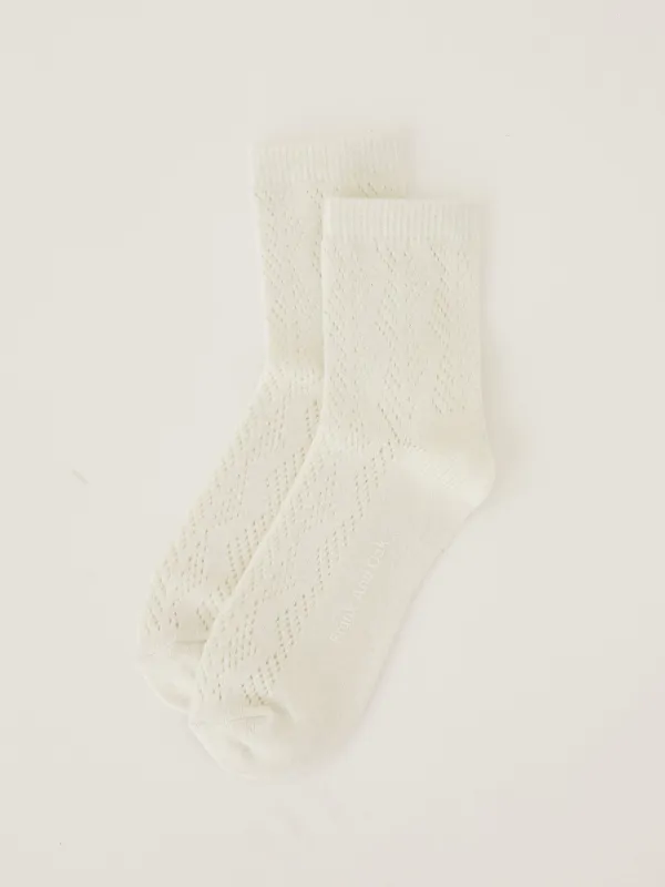 The Pointelle Socks in White sold by Frank & Oak