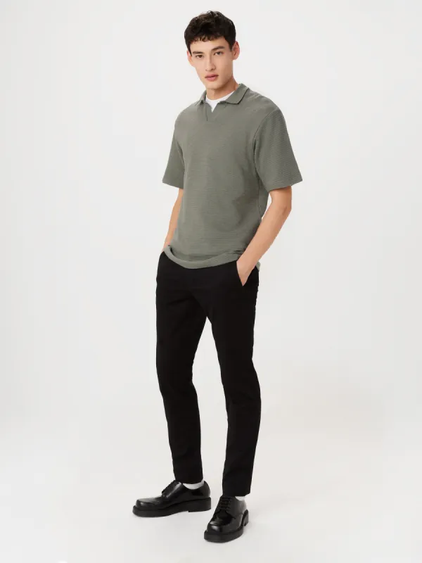 The Johnny Collar Polo in Boreal Green sold by Frank & Oak