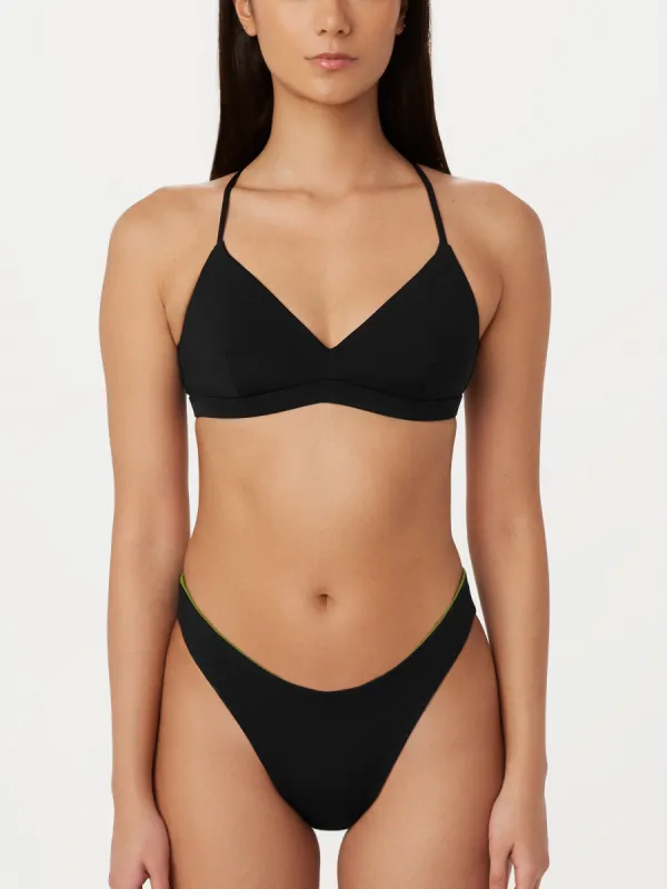 The Mid Rise Reversible Bikini Bottom in Green sold by Frank & Oak