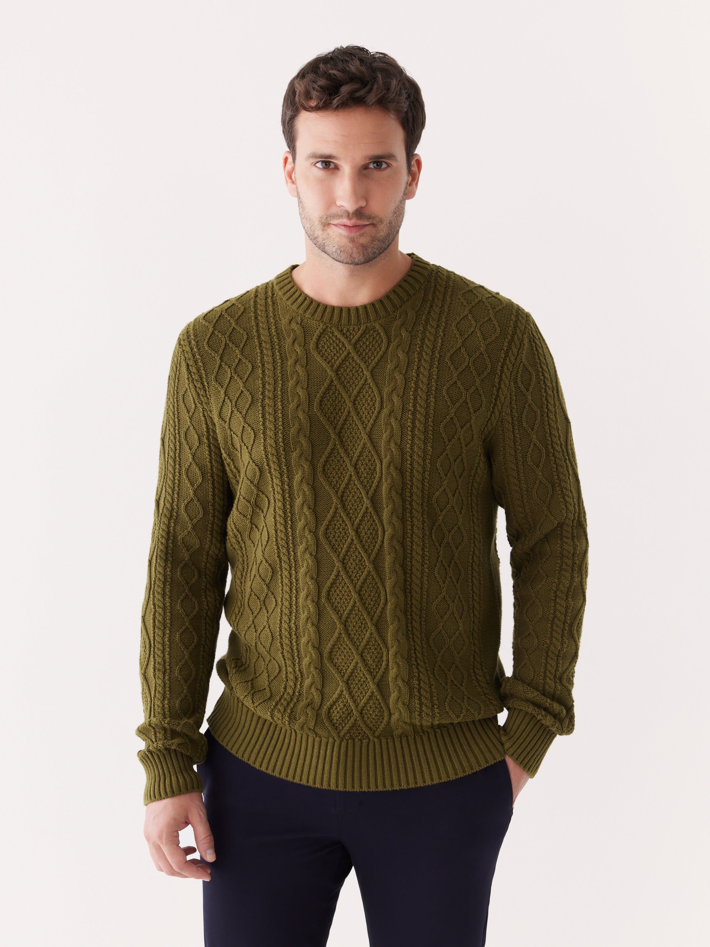 The Organic Cotton Cable Sweater in Dark Olive sold by Frank & Oak