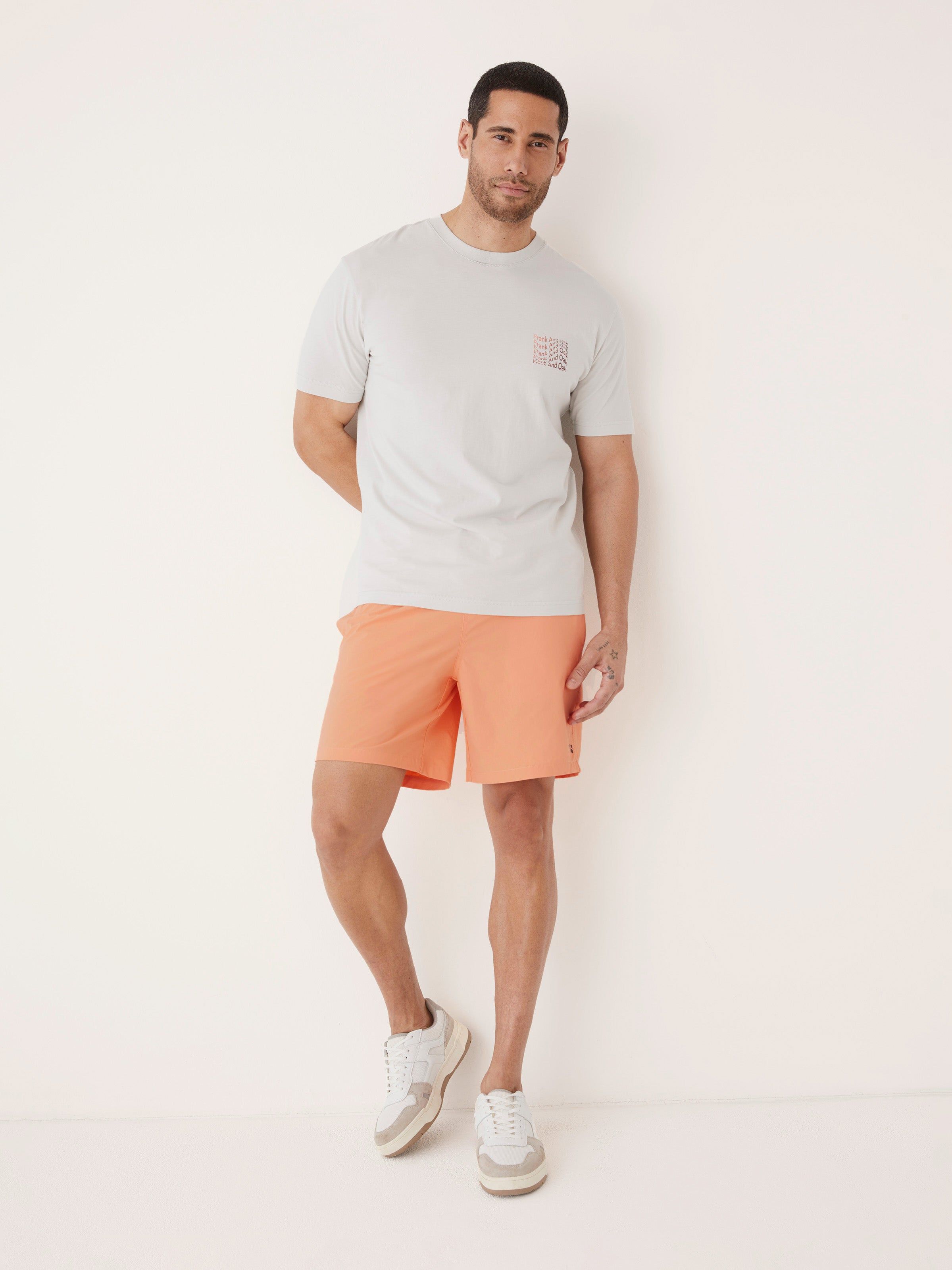 The 7in Swim Short in Coral sold by Frank & Oak