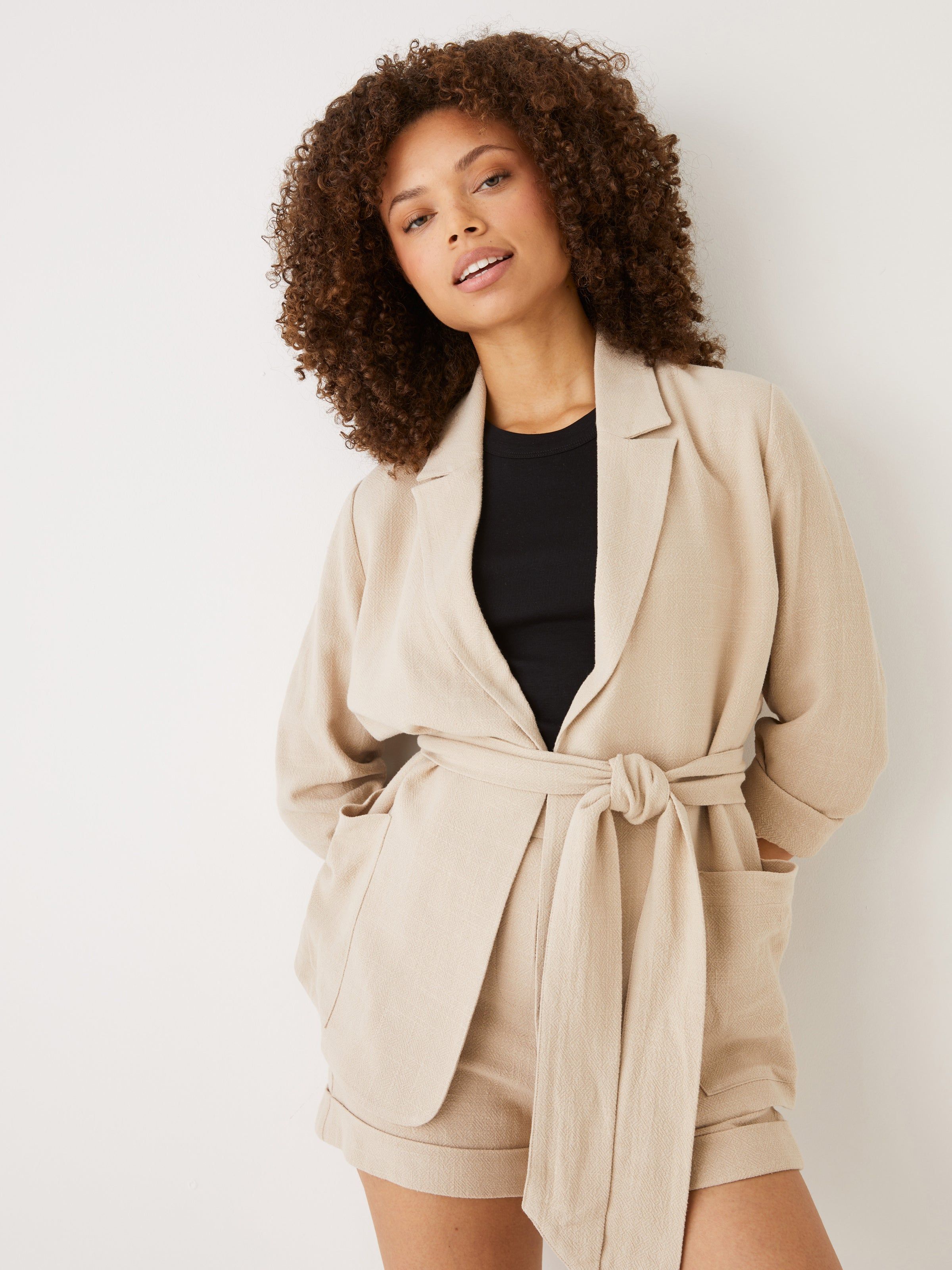 The Linen Blend Belted Blazer in Beige sold by Frank & Oak